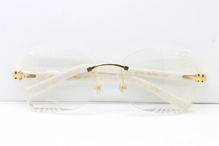 Cartier Rimless T8200762 White Aztec Arms Sunglasses In Gold Clear Lens  