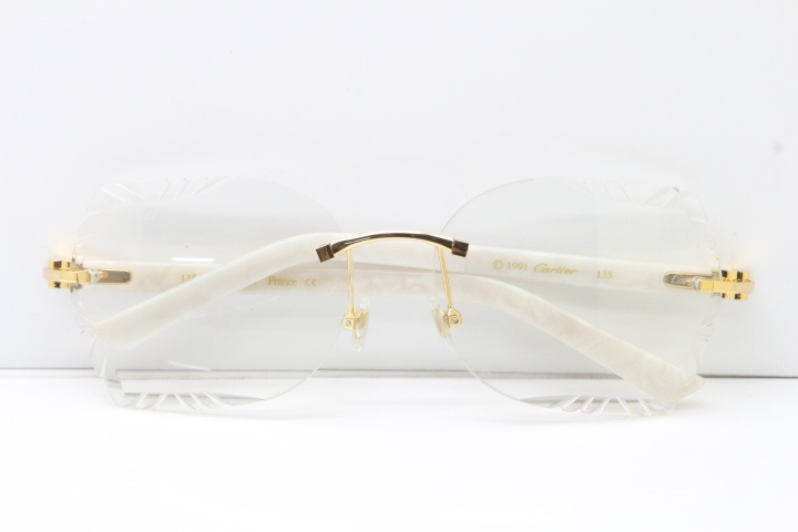 Cartier Rimless T8200762 White Aztec Arms Sunglasses In Gold Clear Lens  