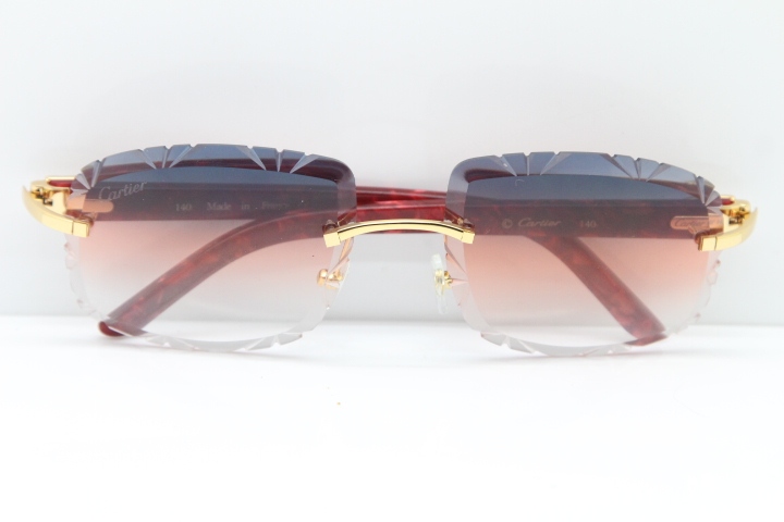 Cartier Rimless 8300816 Marble Red Aztec Arms Sunglasses In Gold Orange Lens