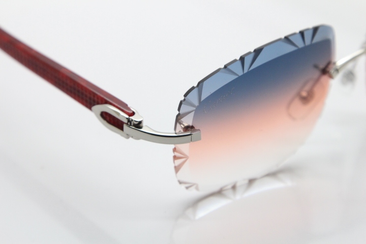 Cartier Rimless 8300816 Marble Red Aztec Arms Sunglasses In Gold Orange Lens