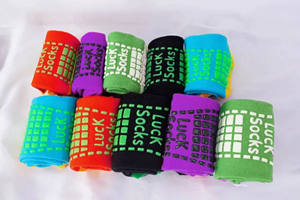 Yuintal jump grippy socks display - Family Park neon grip socks