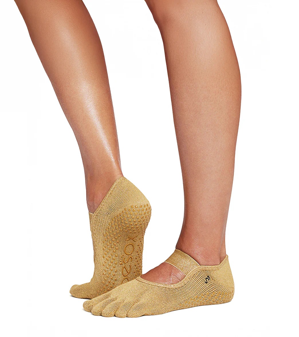 five toe grip socks with non-slip sole worn barefoot for yoga and studio training