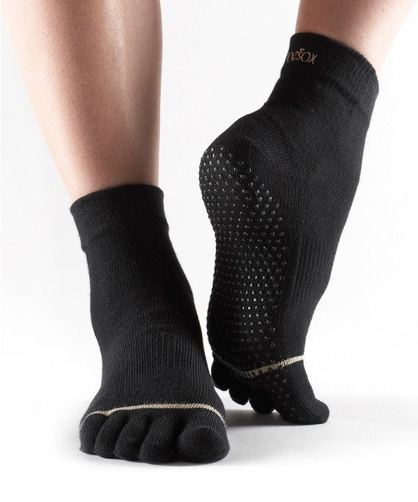half sole grip socks with forefoot focused grip pattern illustrating traction support during toe driven indoor movement