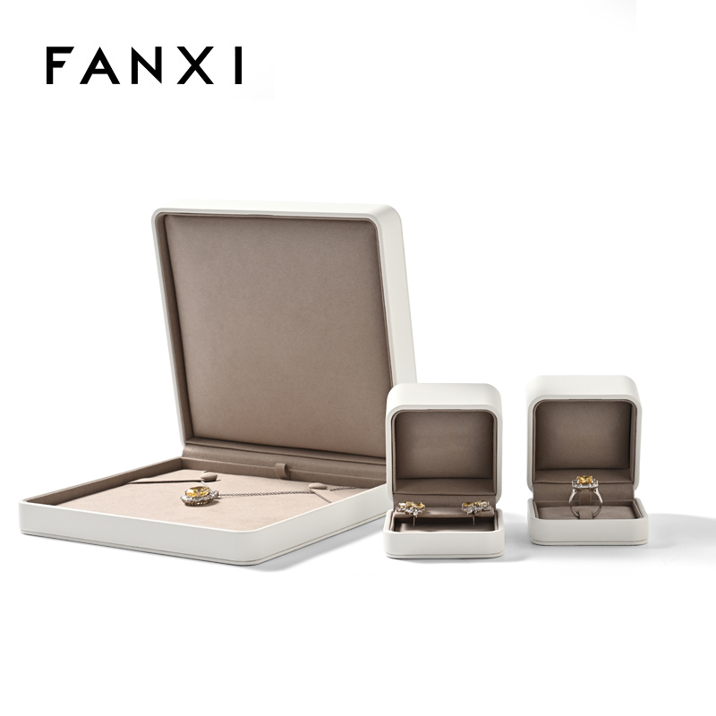 FANXI new arrival high quality white PU leather grey microfiber box with button for ring pendant jewelry package
