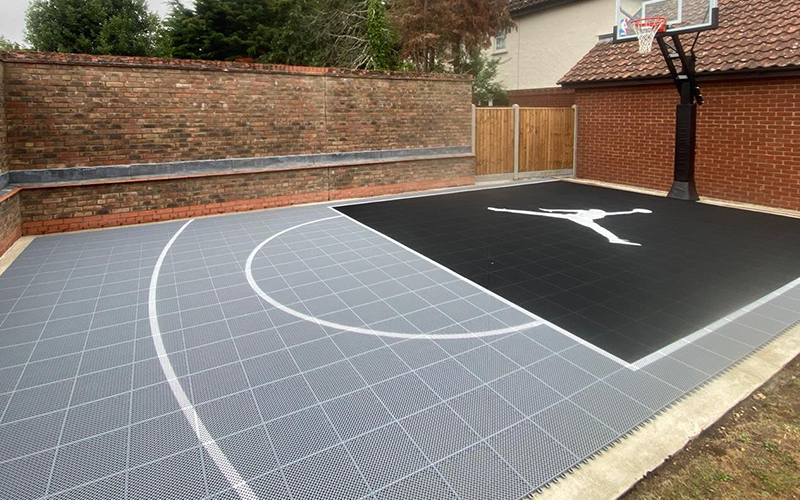 What is the basic foundation for basketball court tiles?