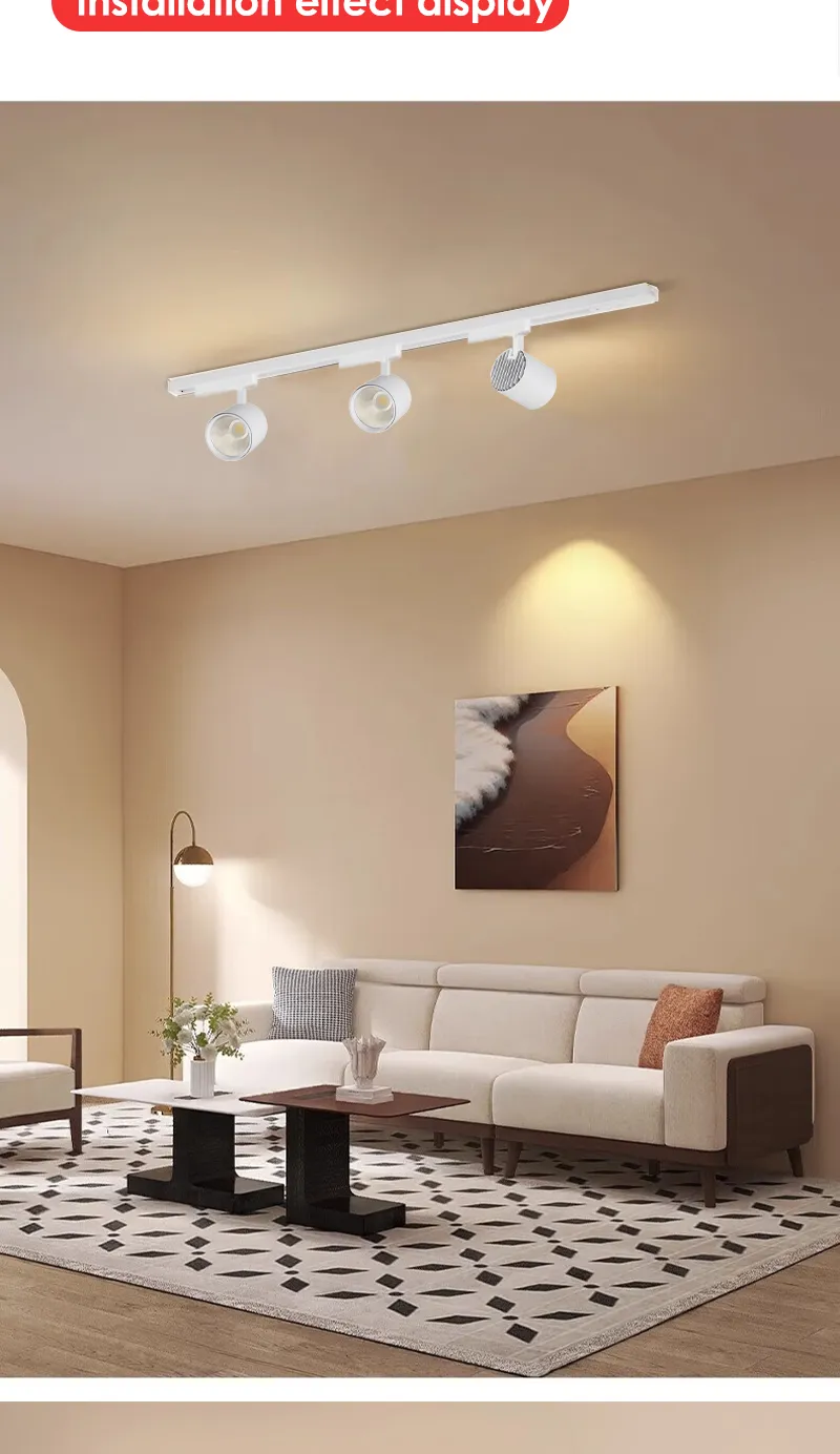 White track lighting installed on a living room ceiling
