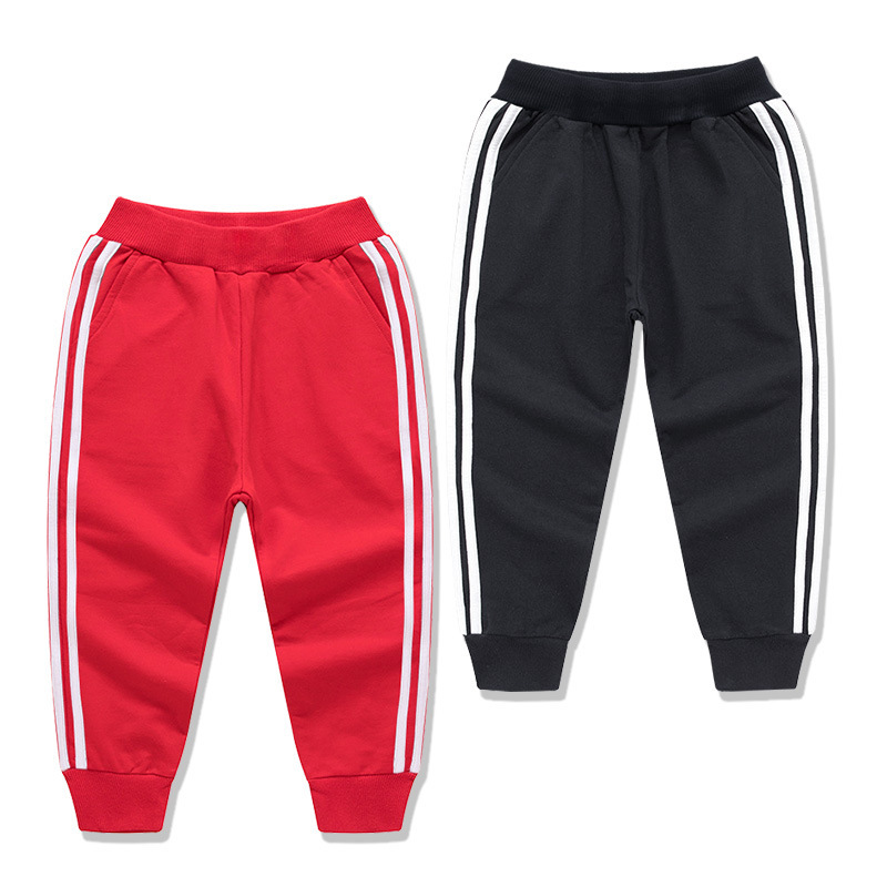 Children's solid color sports pants spot spring and autumn best-selling boys and girls cotton bars trousers factory wholesale