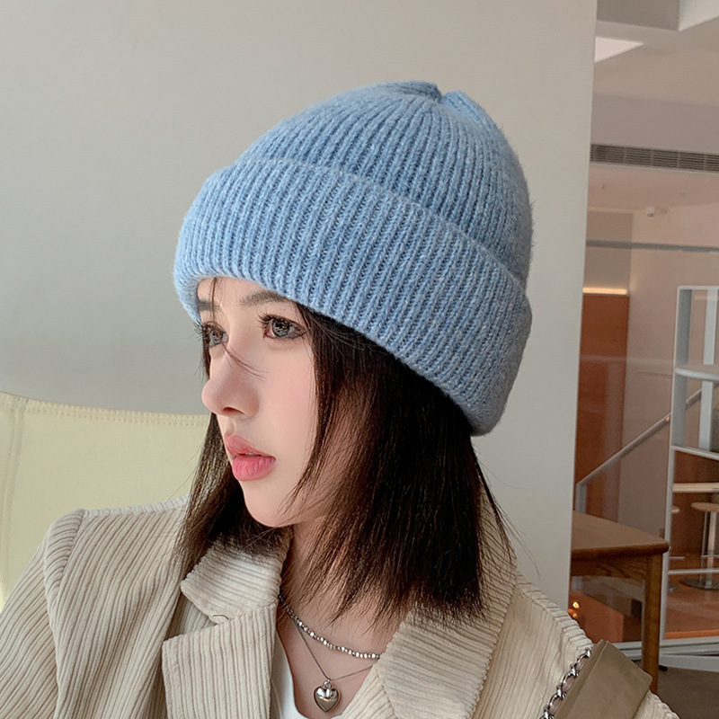 9963 winter New Korean style two-color knitted woolen cap women's fashion all-match thick warm Earflaps slipover hat