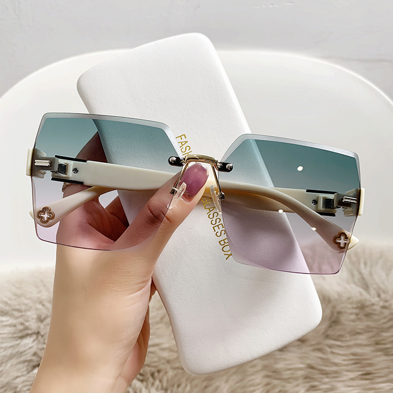 New high-grade women's sunglasses Korean style special frameless cut-edge sunglasses fashion large square frame face without makeup glasses