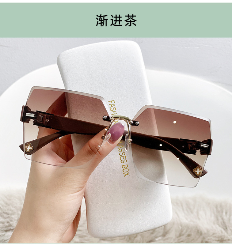 New high-grade women's sunglasses Korean style special frameless cut-edge sunglasses fashion large square frame face without makeup glasses