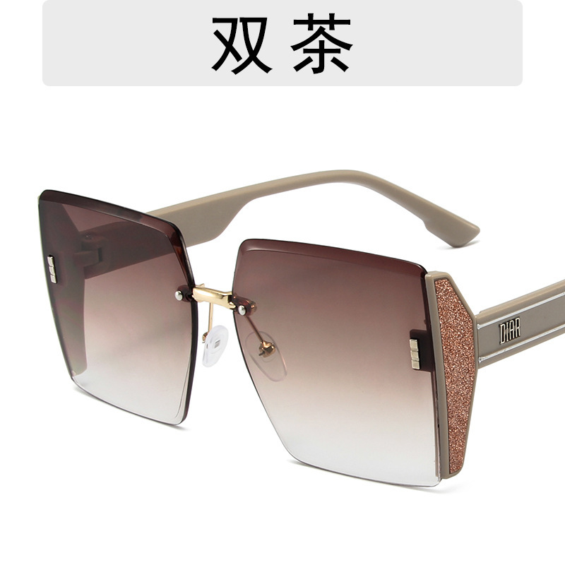 Luxury shiny sunglasses women's fashionable frameless trimming oversized TikTok sunglasses affordable luxury fashion Wind beach glasses