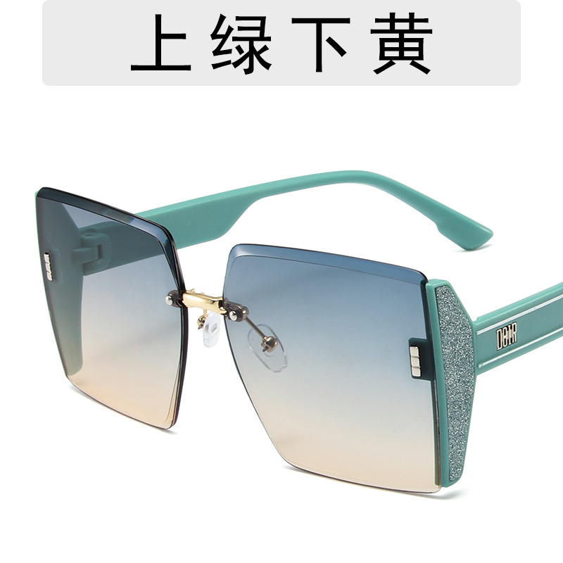 Luxury shiny sunglasses women's fashionable frameless trimming oversized TikTok sunglasses affordable luxury fashion Wind beach glasses