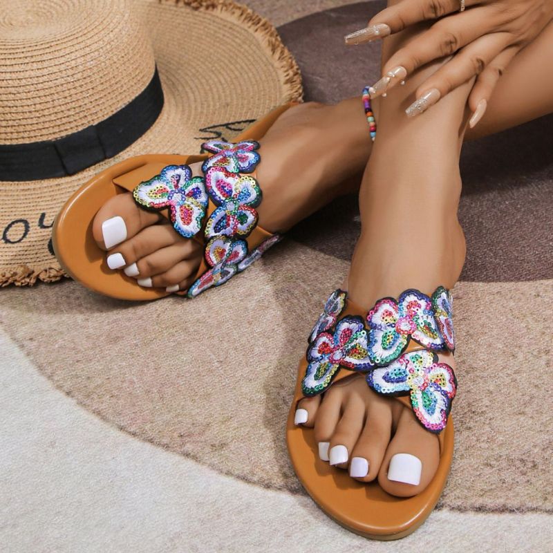 Cross-border foreign trade new bow embroidered flat slippers women's outer wear cross strap lightweight beach slippers wish