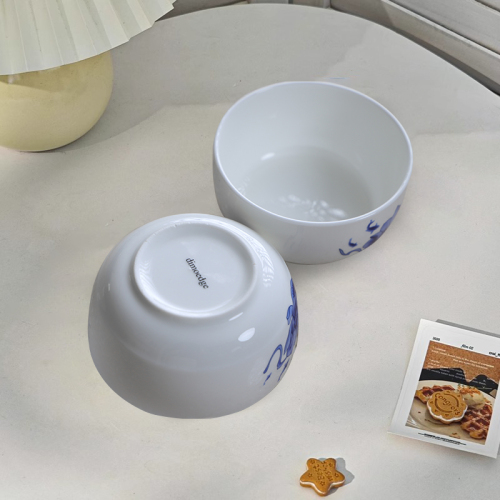 Elegant White Ceramic Bowl with Classic Blue and White Porcelain Pattern
