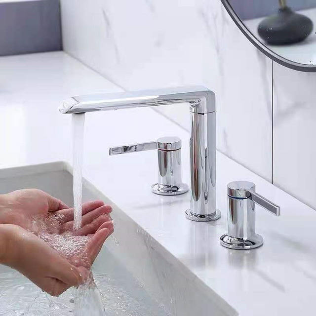 widespeead bathroom sink faucet with 3 holes