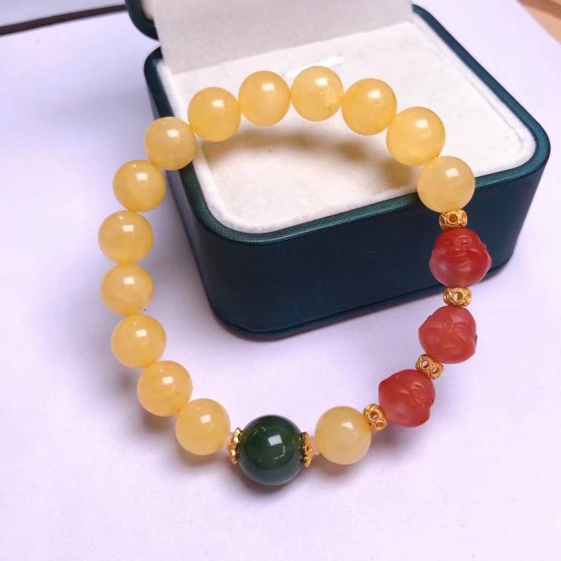 Natural Amber Bracelet with Natural Nanhong Buddha Head, Hetian Jade Round Beads, and 925 Silver Accents