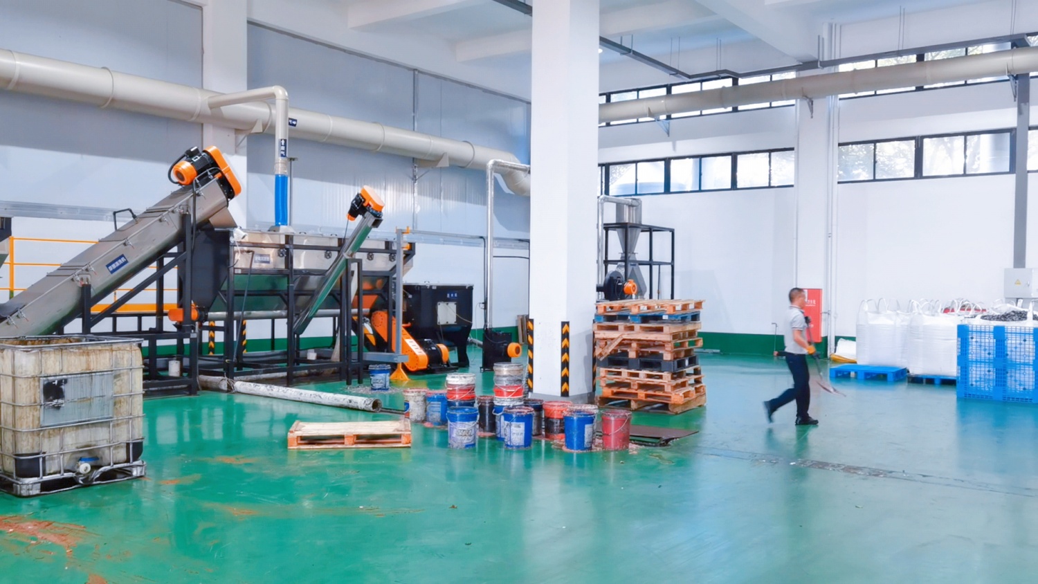Plastic hazardous packaging container shredding and washing line