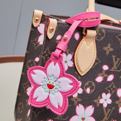 LV x TM OnTheGo PM Tote Bag