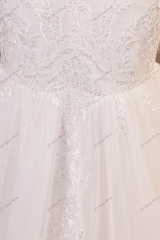 Glitter Tulle Mermaid Wedding Dress With Deep V-neck And Lace Appliqués
