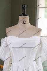 A Silhouette Satin Bridal Gown With Split Skirt