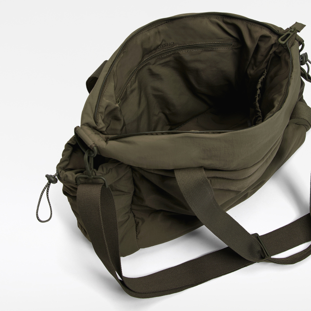 Side pockets sports bag