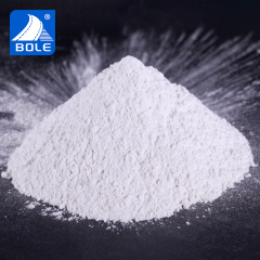Close-up view of pure Titanium Dioxide powder, showcasing its fine texture and bright white color for superior opacity and coverage.