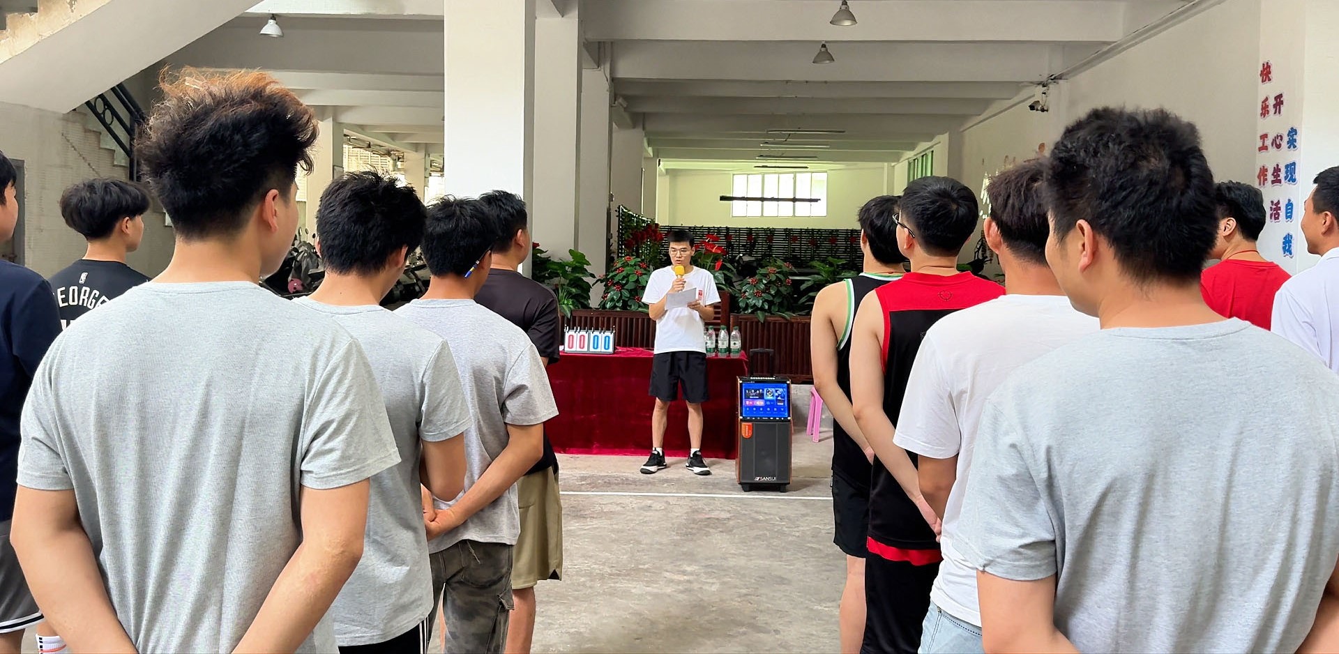 DHOMA employees participating in a staff basketball competition