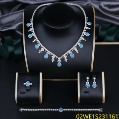 Blossom CS Jewelry 925 Sterling Silver Teardrop Turquoise Blue CZ 4 Piece Women Bridal Jewelry Set