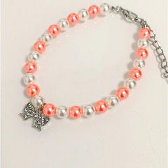 pearl necklace bow tie
