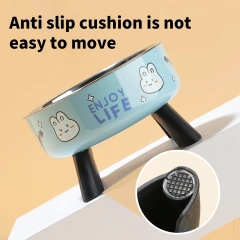 A cartoon printed high-legged pet bowl, large-capacity stainless steel dog bowl, neck-protecting cat bowl, universal fashion and