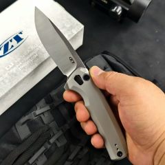 ZT 0044BLK Button Lock Flipper Knife 3.11" CPM-S45VN DLC Drop Point Blade, Titanium Handles
