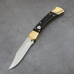 Buck 110/112 AUTO Folding Hunter 3.74" D2 Plain Blade, Ebony Wood Handles, Leather Sheath