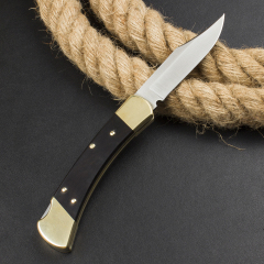 Buck 110 AUTO Elite Folding Hunter 3.74" D2 Plain Blade, Ebony Wood Handles, Black Leather Sheath