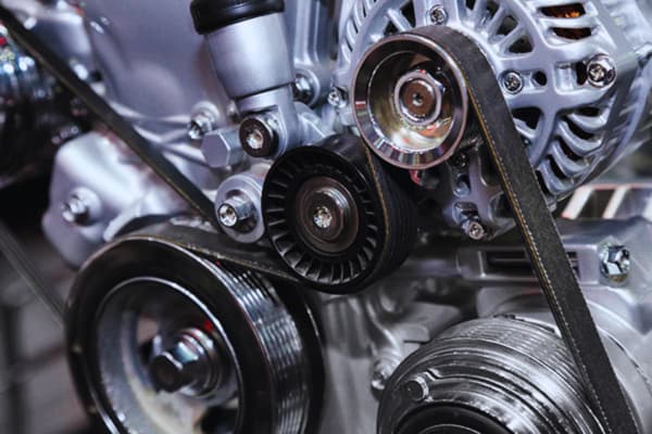 Belt tensioner reducing vibration that worsens Symptoms of a bad crankshaft position sensor