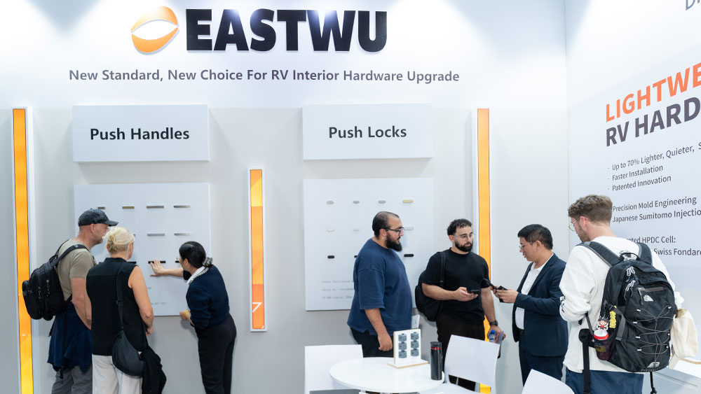 RV hardware product presentation and customer interaction at Caravan Salon Düsseldorf