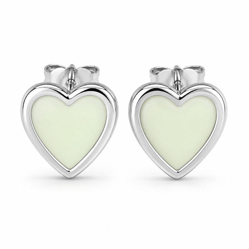 Glow in the dark heart stud earrings with luminous off-white material