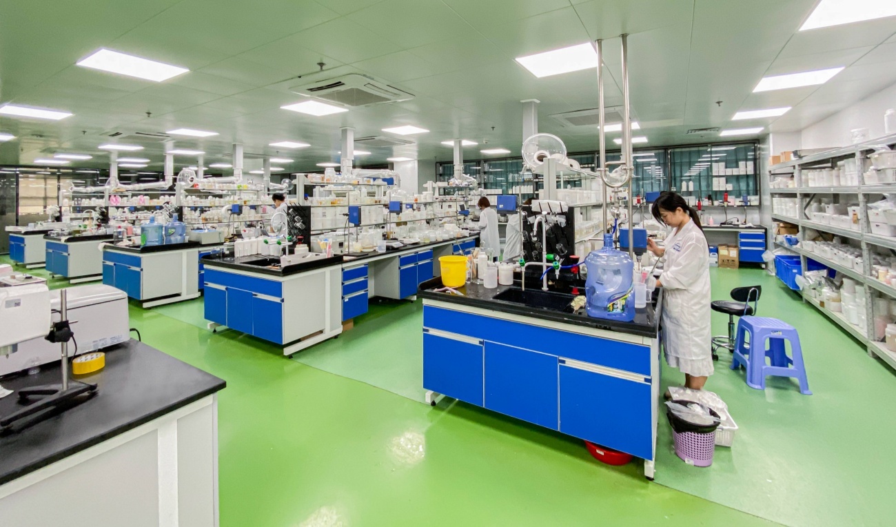 Clean laboratory with professional production line and testing equipment