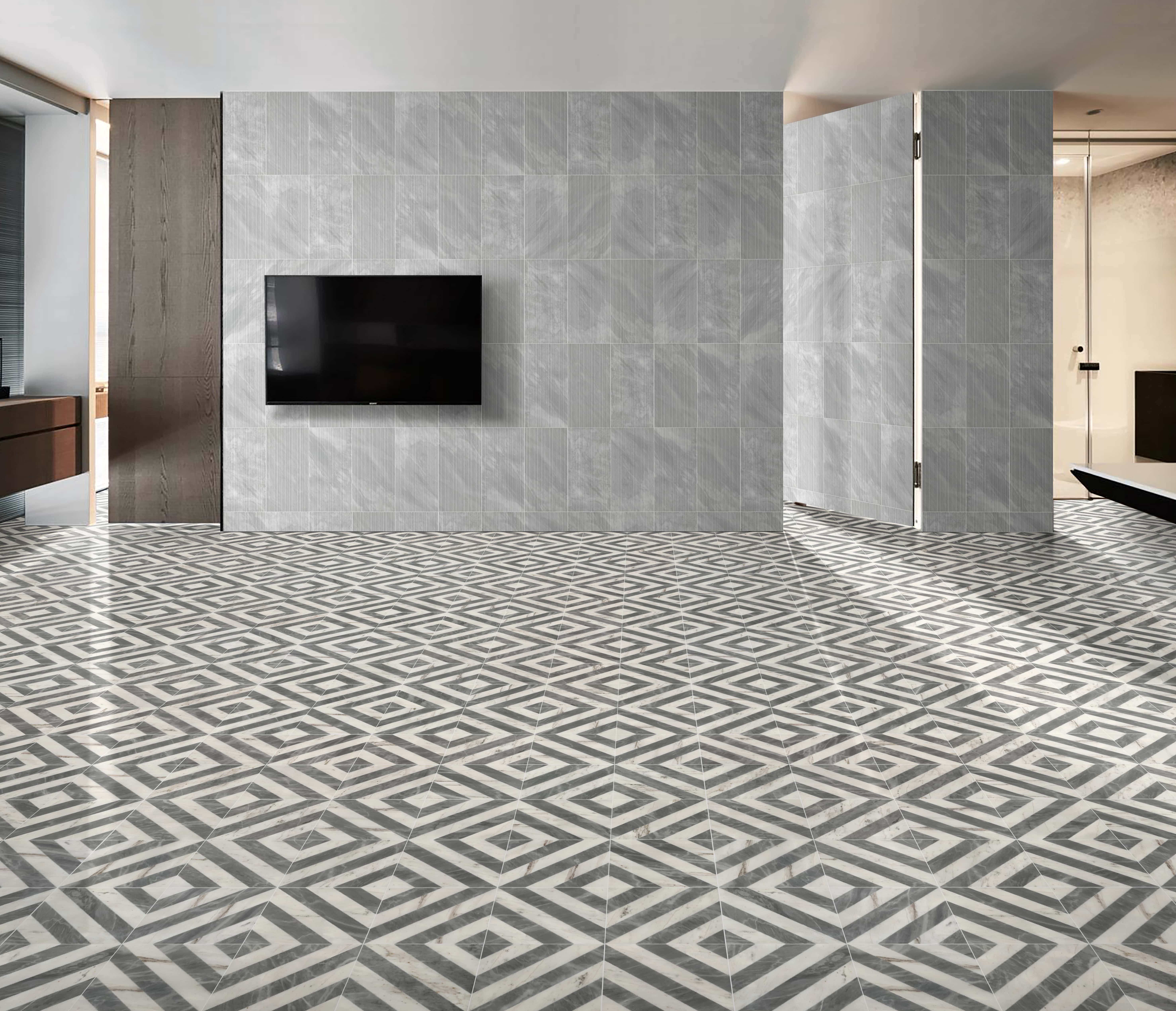 Contemporary living room featuring 12x12 waterjet marble floor tiles perfectly paired with 12x24 Carrara Gray OL textured wall tiles for a luxurious contrast.