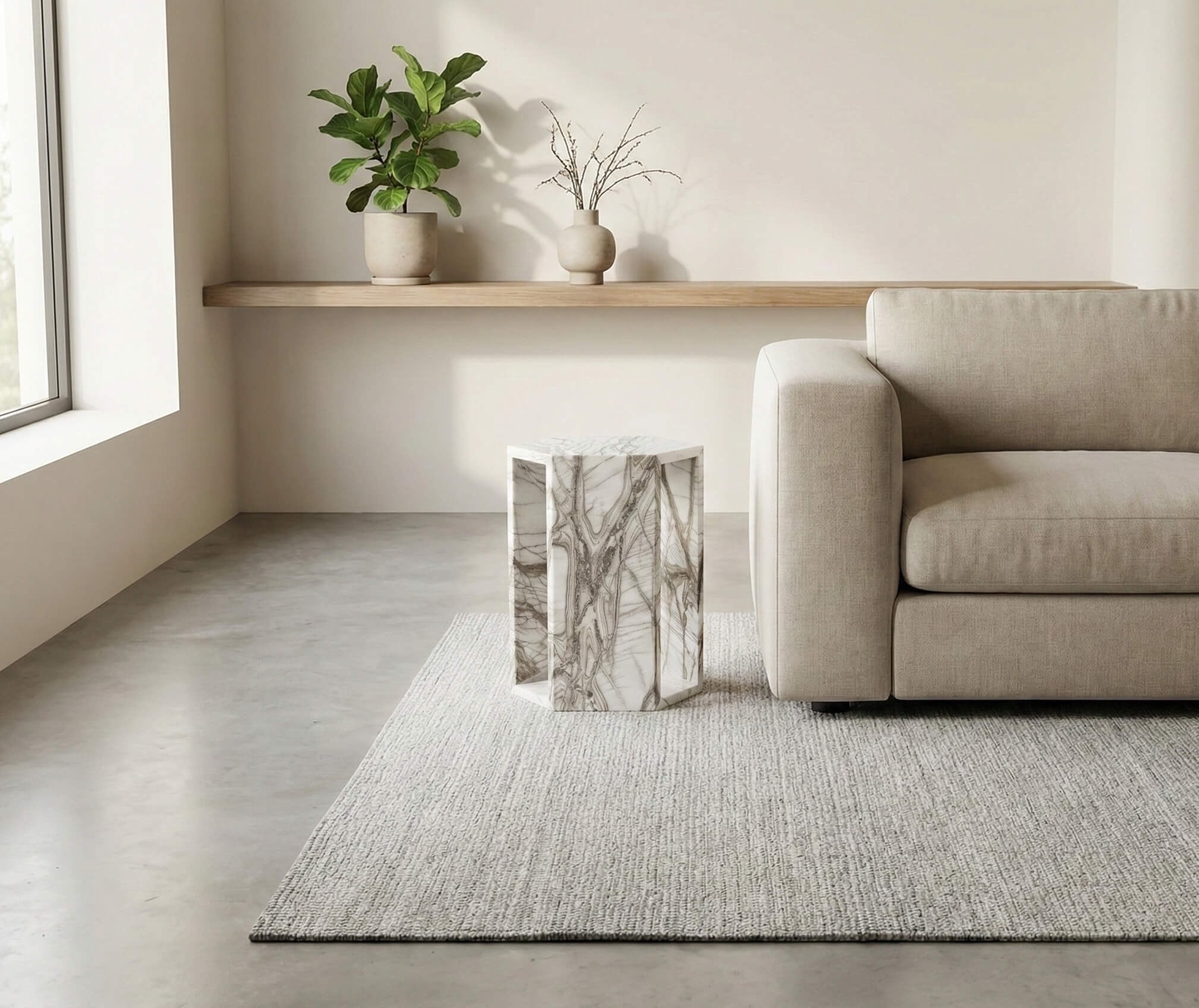 Arboris White natural marble hexagon end table styled on neutral rug in bright space.