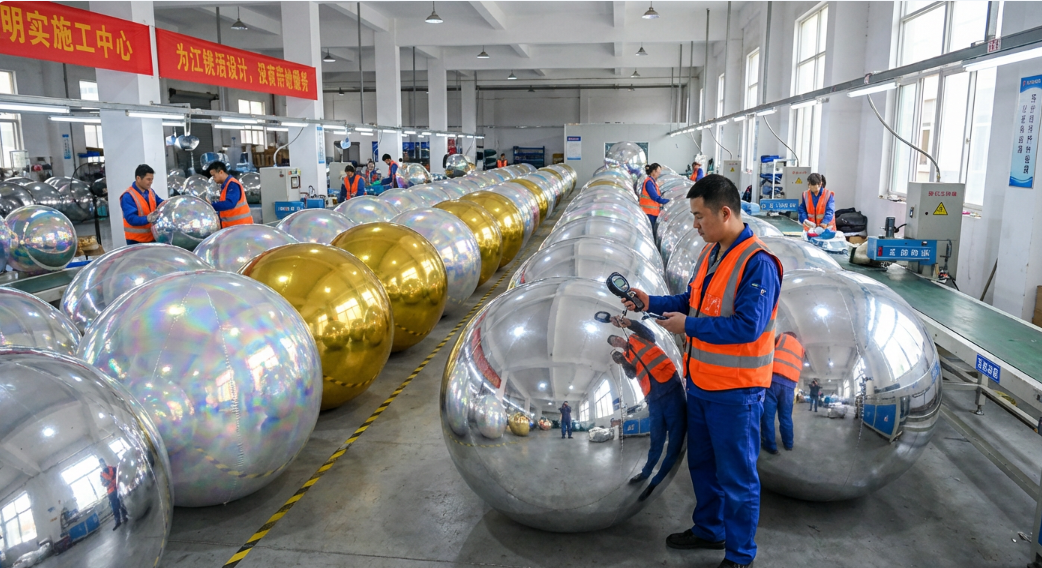 Factory quality control inspection: performing the 24-hour inflation test on mirror balls in China.
