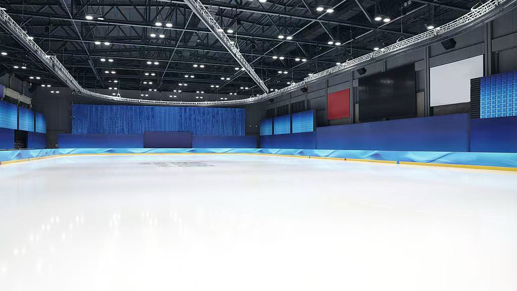 Smooth ice surface maintained with professional resurfacing and layered flooding