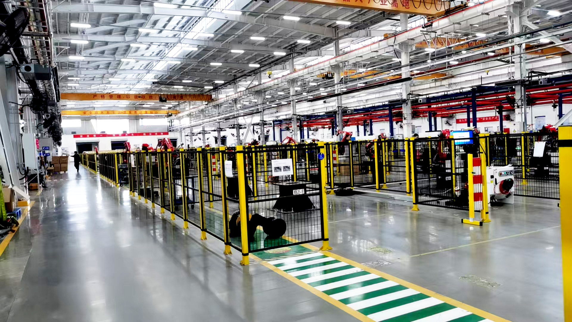 Industrial safety fence system installed in a modern automated factory
