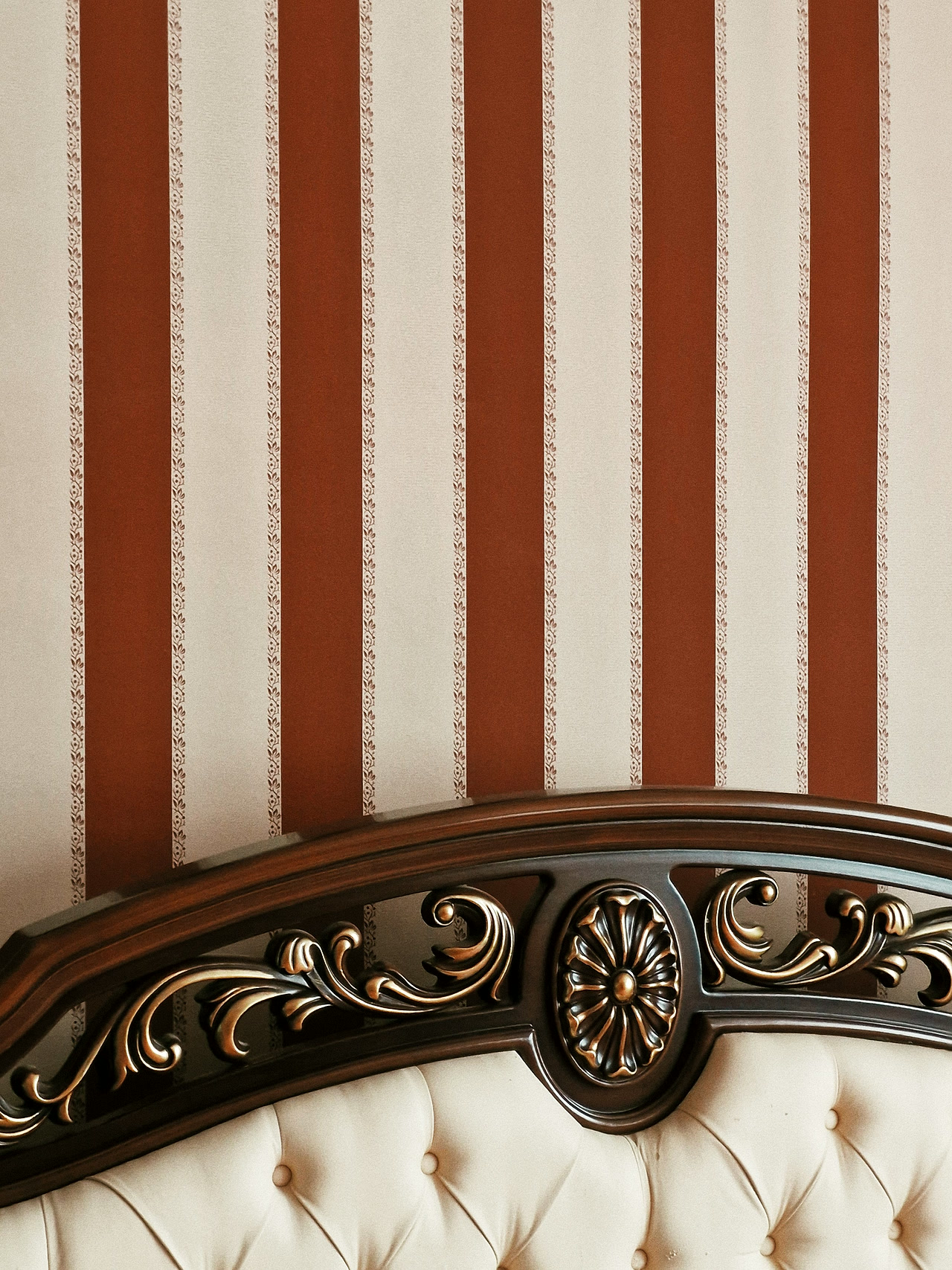Classical bedroom with upholstered tufted headboard