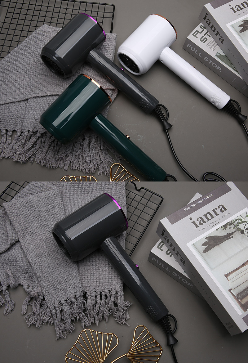 Three hair dryers shown in dark grey, dark green and white colour options
