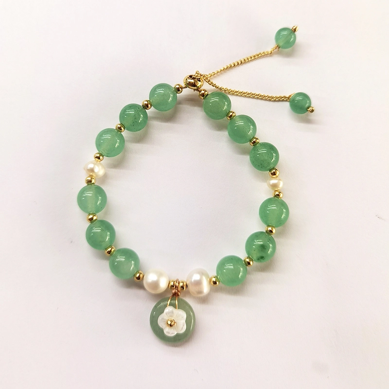 Close view of ocean-style freshwater pearl and natural stone bracelet