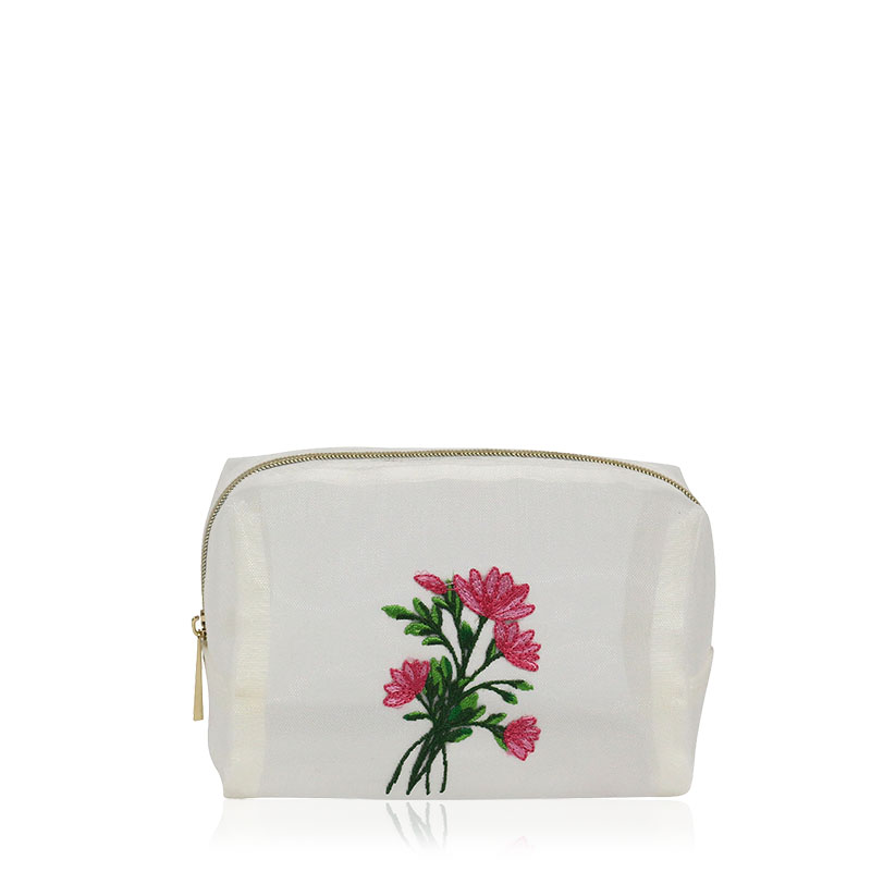 Embroidered cosmetic pouch artwork sample