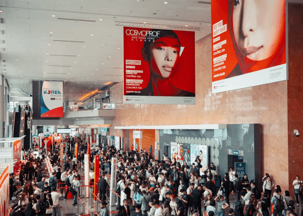 Cosmoprof Asia 2025 Buzz A bustling view of the Cosmoprof Asia 2025 event floor, capturing the energy of the crowd.