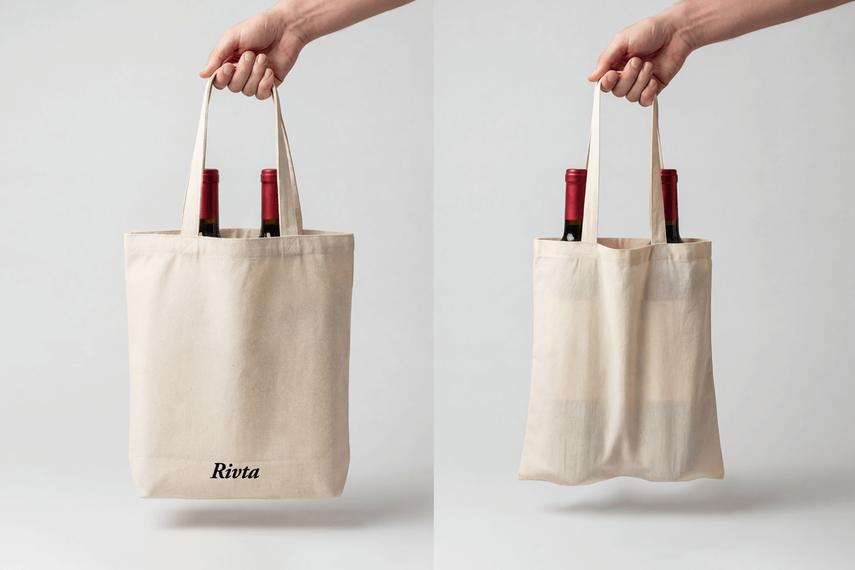 Zero-Sagging Structural Tote Design Side profile of tote bag holding heavy wine bottles with a perfectly flat bottom