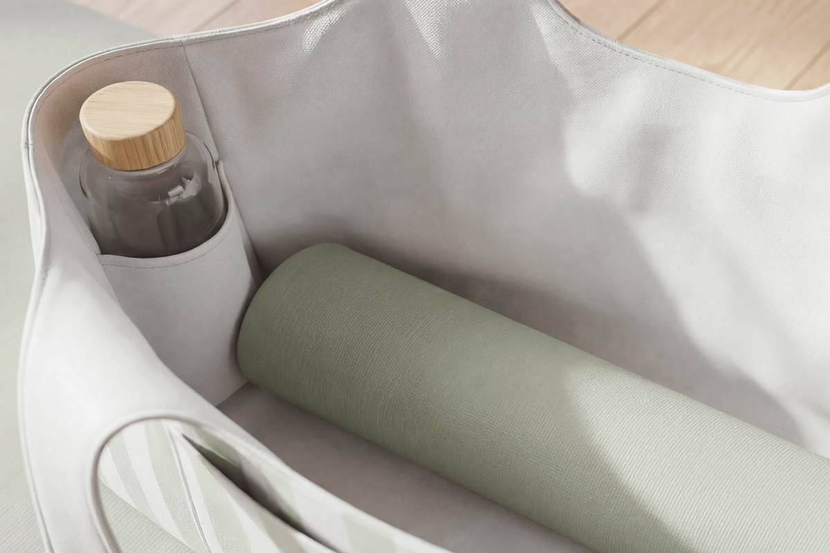 X-ray style view of yoga tote showing internal mat strap and bottle compartment