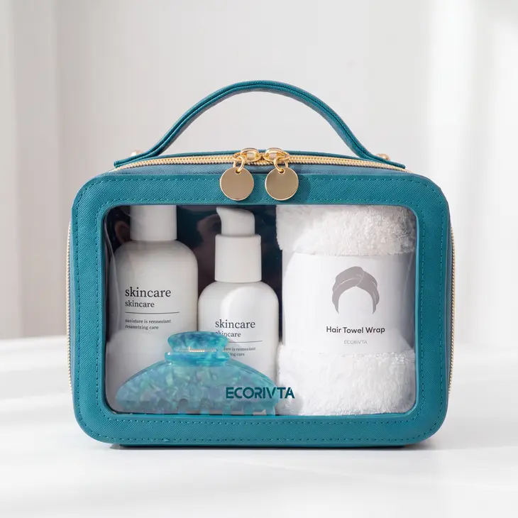 Teal carry case with a clear front panel, top handle and double zipper pulls